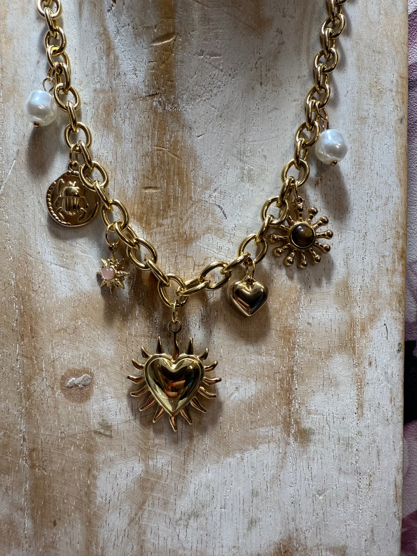 Collier cœur enflammé